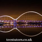 Image showing the River Tees spanned by the Infinity Bridge with the teesturors for private tuition logo